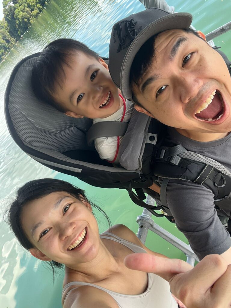 Ansel in a family photo, being carried by his father | Rare Disorders Society (Singapore) [RDSS]