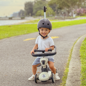 Ansel using a trike to navigate a park connector | Rare Disorders Society (Singapore) [RDSS]