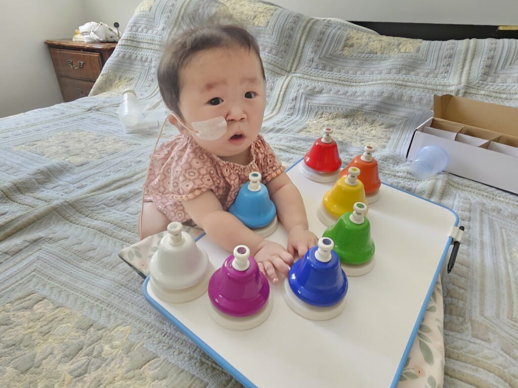 Baby Eva playing with her toys | Rare Disorders Society (Singapore) [RDSS]